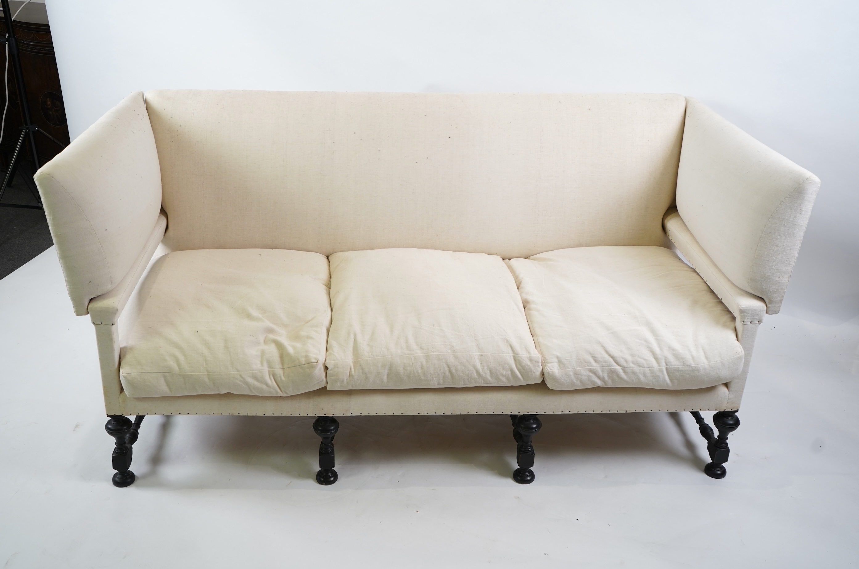 A Jacobean revival Knowle type three seater sofa